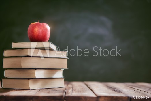 Picture of Apple and pile of books